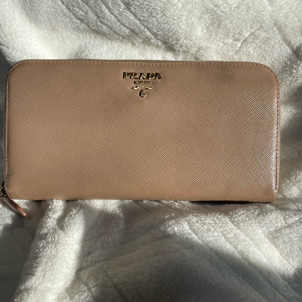 Prada staffiano long zippy wallet.
